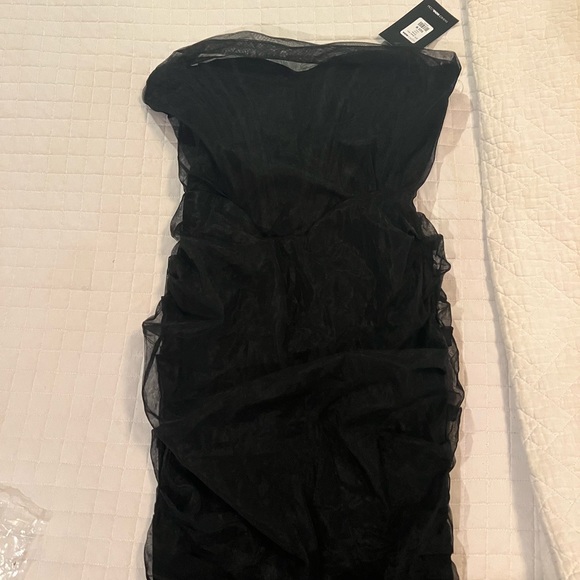 Beautiful black halter top dress, perfect for a night out on the town. - Picture 2 of 4